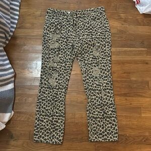 Leopard print distressed jeans.